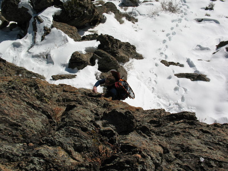 Michael following Alan up the rock face.