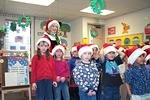 Rebecca singing Christmas carols at school