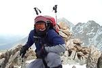 Smudge on the summit.  We had to kneel because the wind was so strong it kept knocking us down.